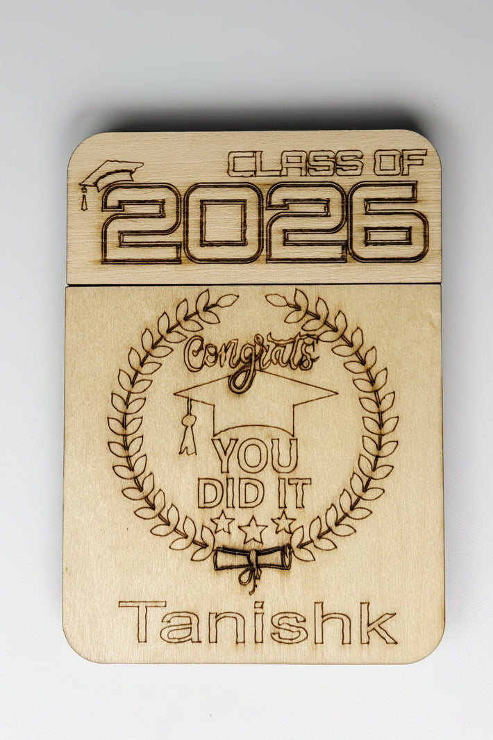 Wooden card with 'Class of 2026' and 'Congrats You Did It with your name on it.