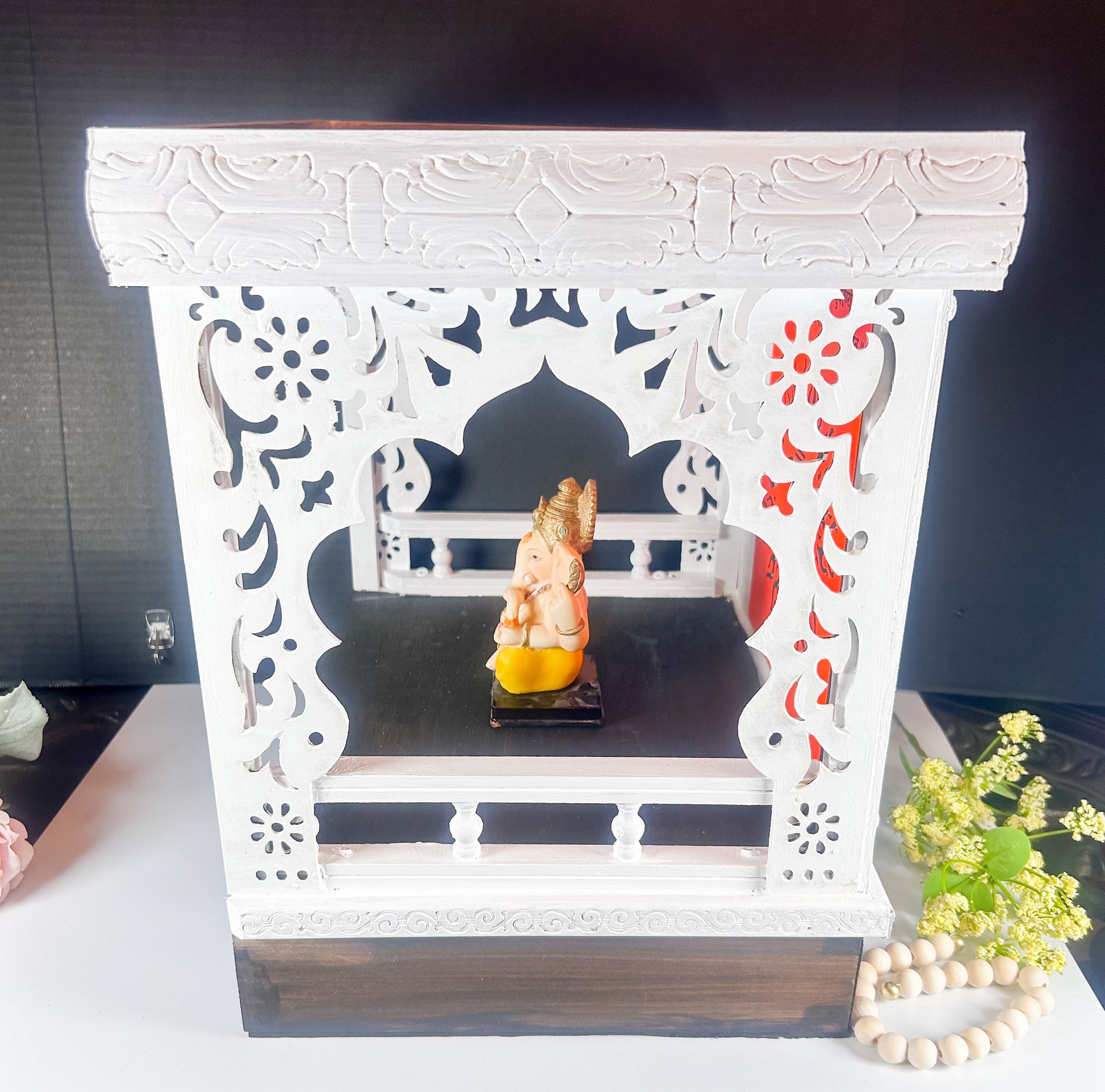     Beautiful wooden Hindu temple shrine for home, perfect for displaying idols, diyas, and spiritual decor.