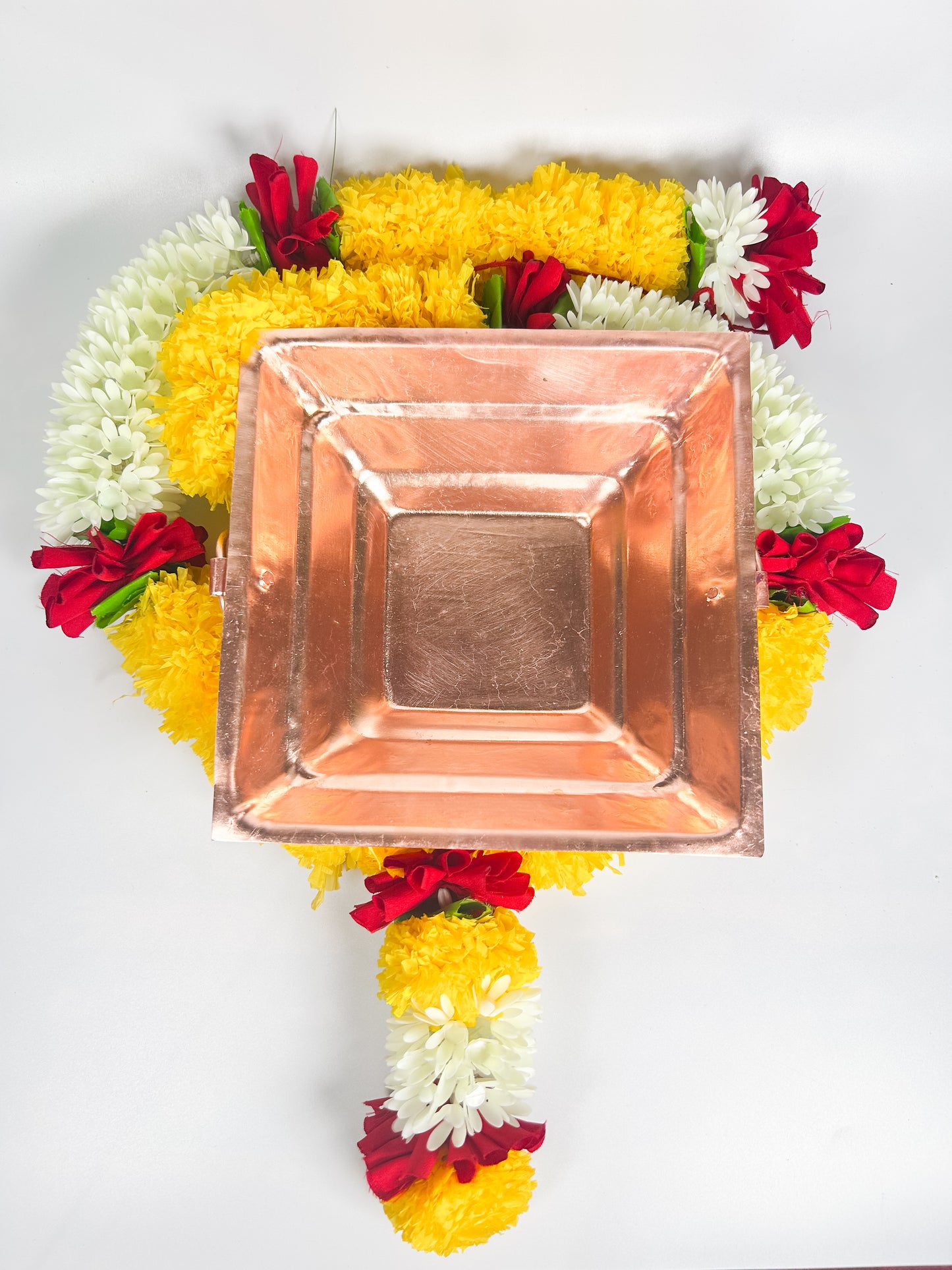 Handmade Copper Fire Bowl Havan Kund for Vedic Rituals, Sacred Hindu Worship Decor with Floral Arrangement